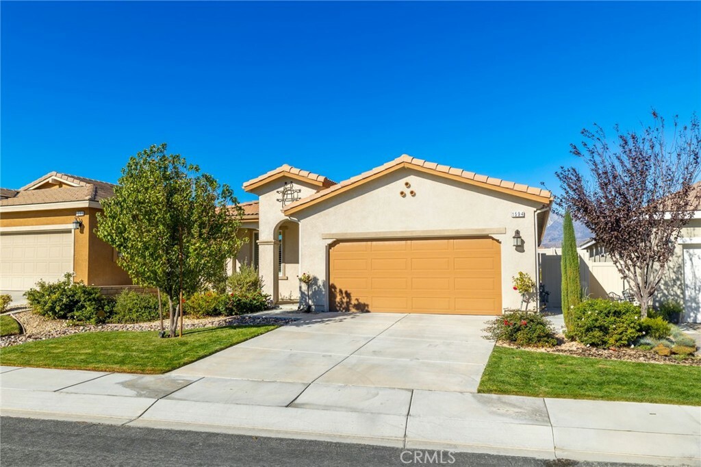 Property Photo:  1594 Alissa Flowers  CA 92223 