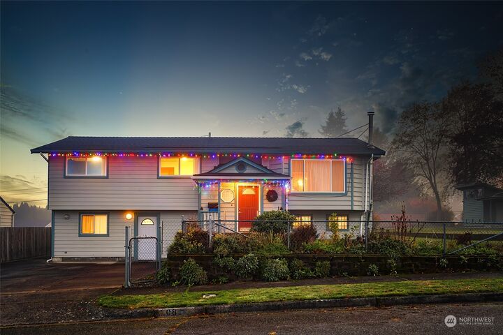 Property Photo:  208 E 62nd Street  WA 98404 