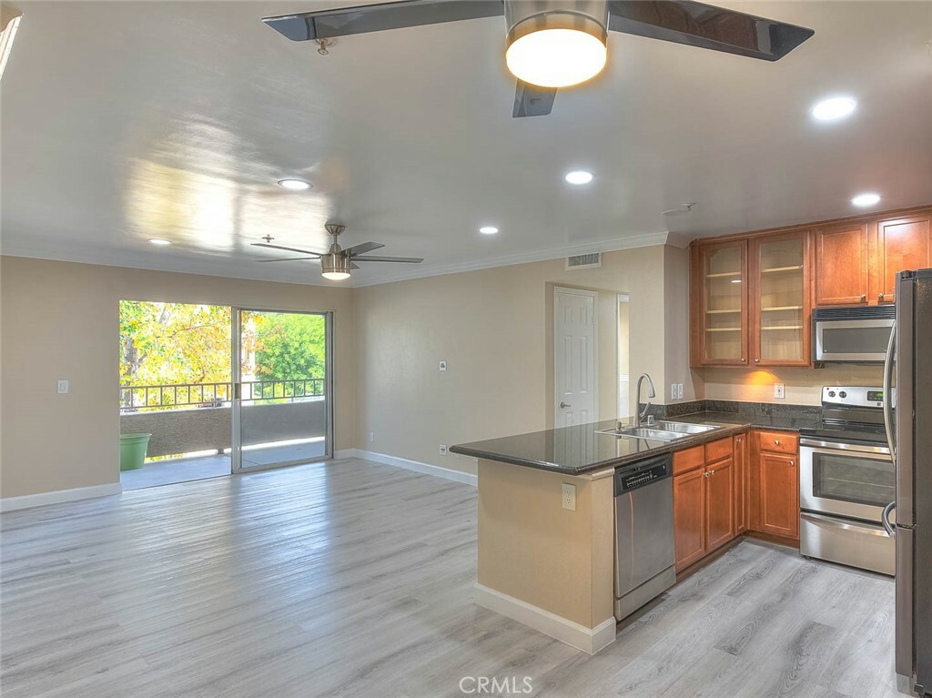 Property Photo:  1010 La Terraza Circle 207  CA 92879 