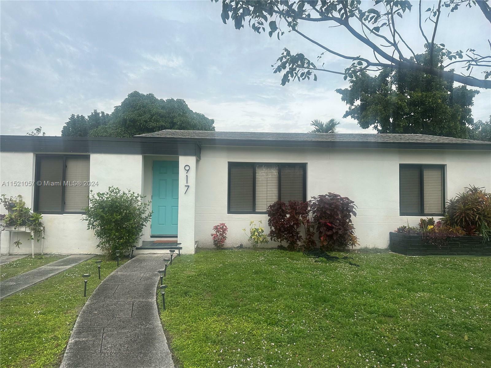 Property Photo:  917 NW 145th Ter A  FL 33168 