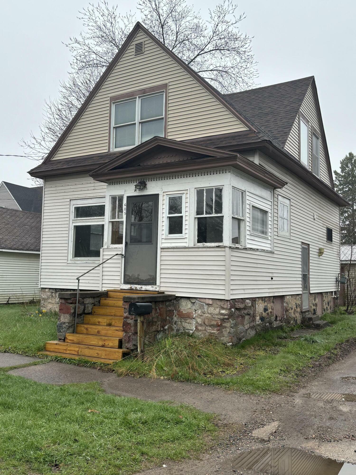 Property Photo:  605 Adams Ave  MI 49783 