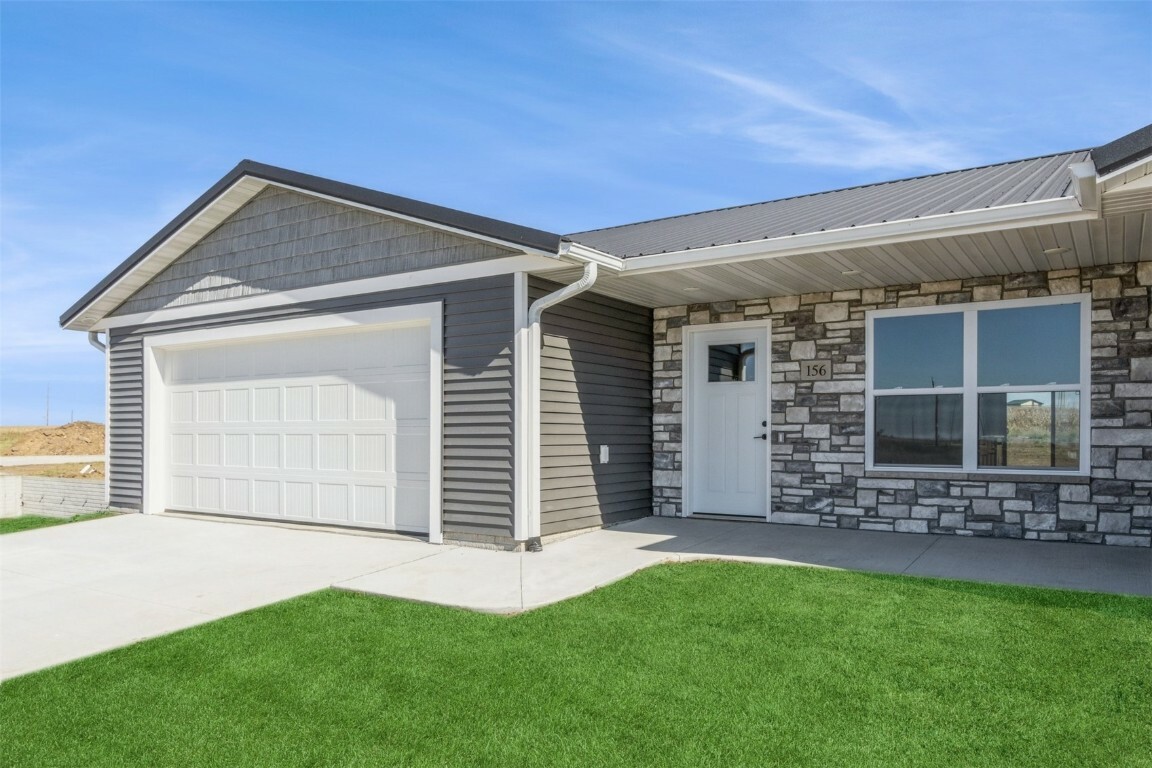 Property Photo:  144 Towne Centre Dr  IA 52345 