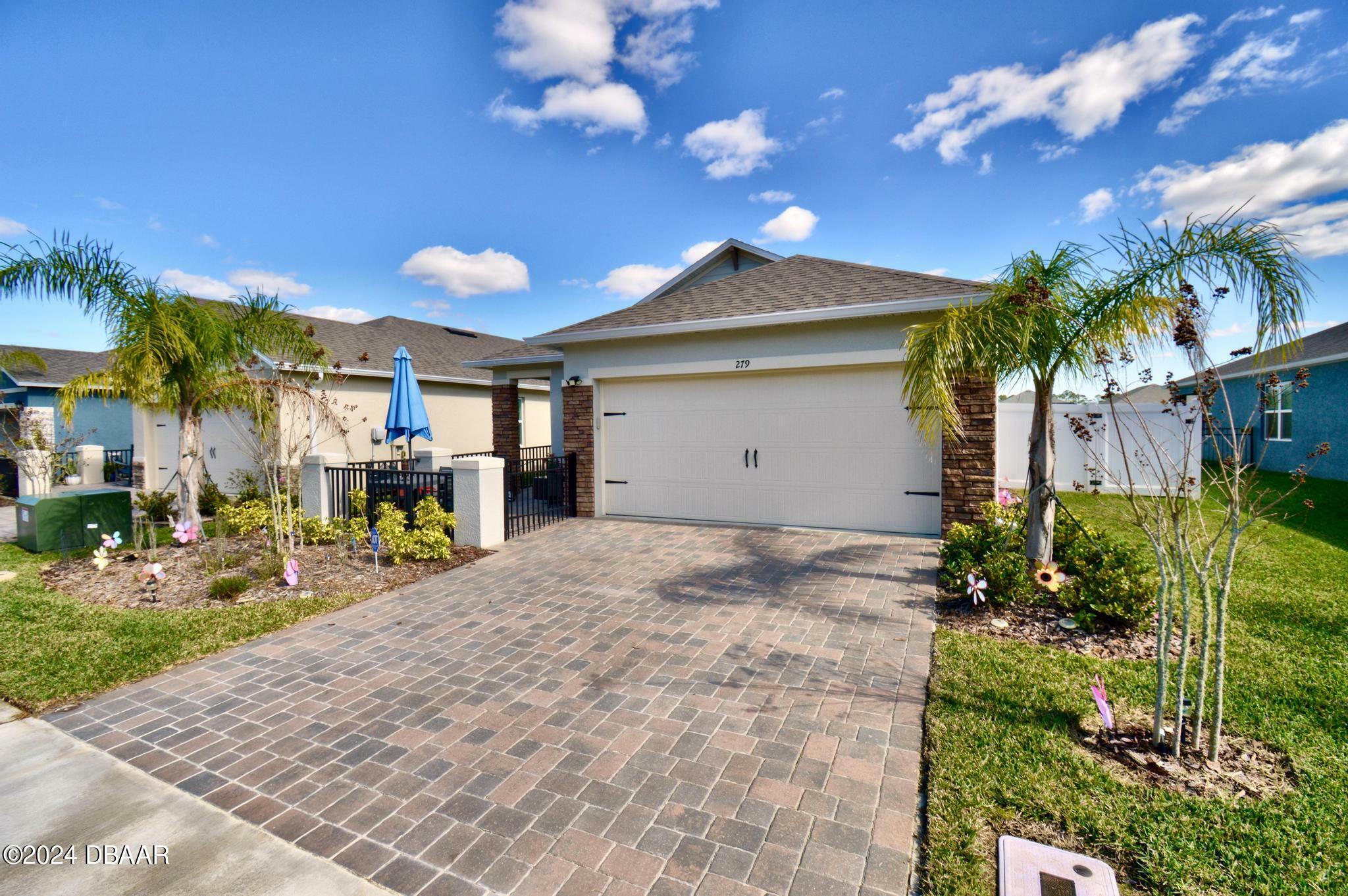 Property Photo:  279 Caryota Court  FL 32168 