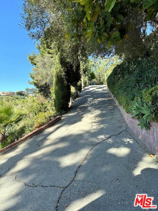 Property Photo:  12010   Chalon Rd  CA 90049 