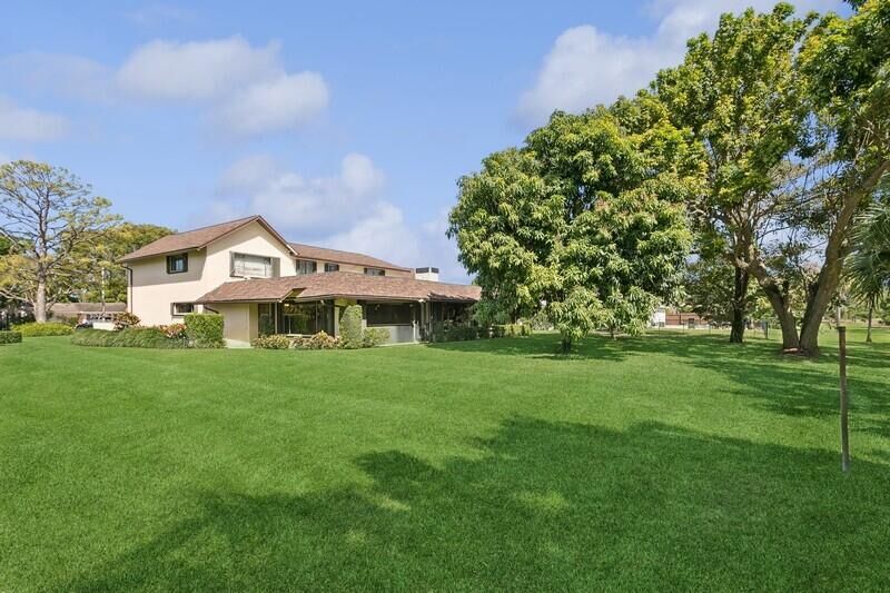 Property Photo:  4456 Hickory Drive  FL 33418 
