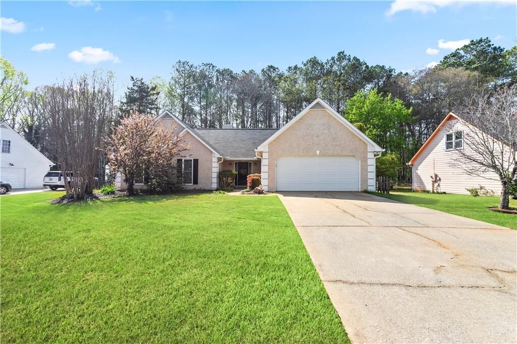 Property Photo:  5104 Glore Road SW  GA 30126 