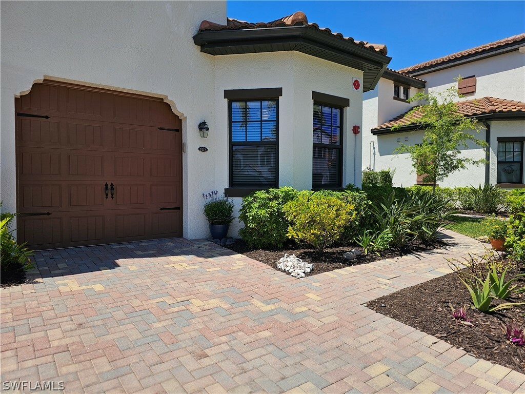 Property Photo:  11780 Grand Belvedere Way 103  FL 33913 