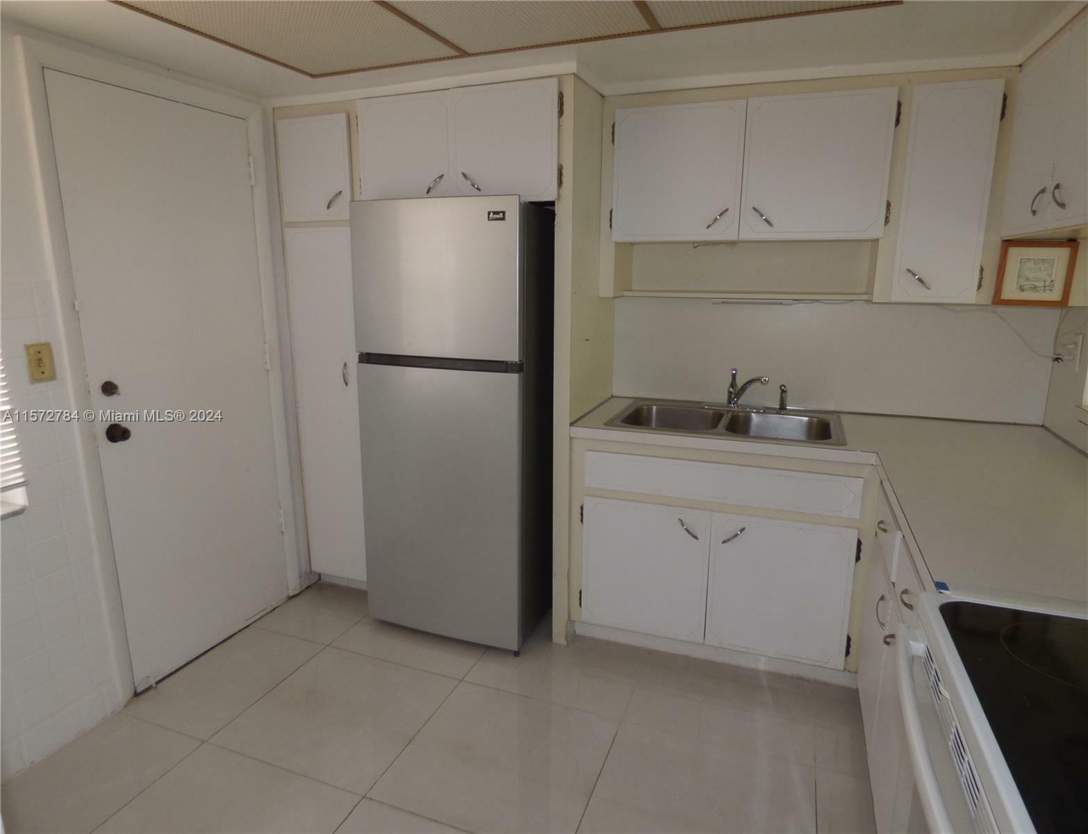 Property Photo:  1551 NE Miami Gardens Dr 123  FL 33179 