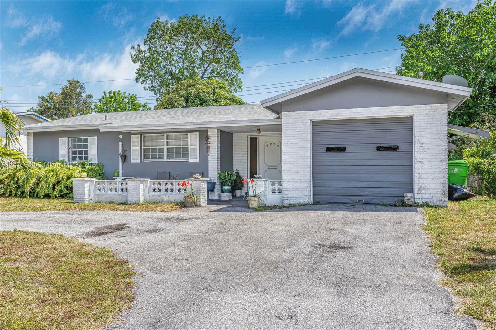 Property Photo:  5926 NW 15th Ct  FL 33313 