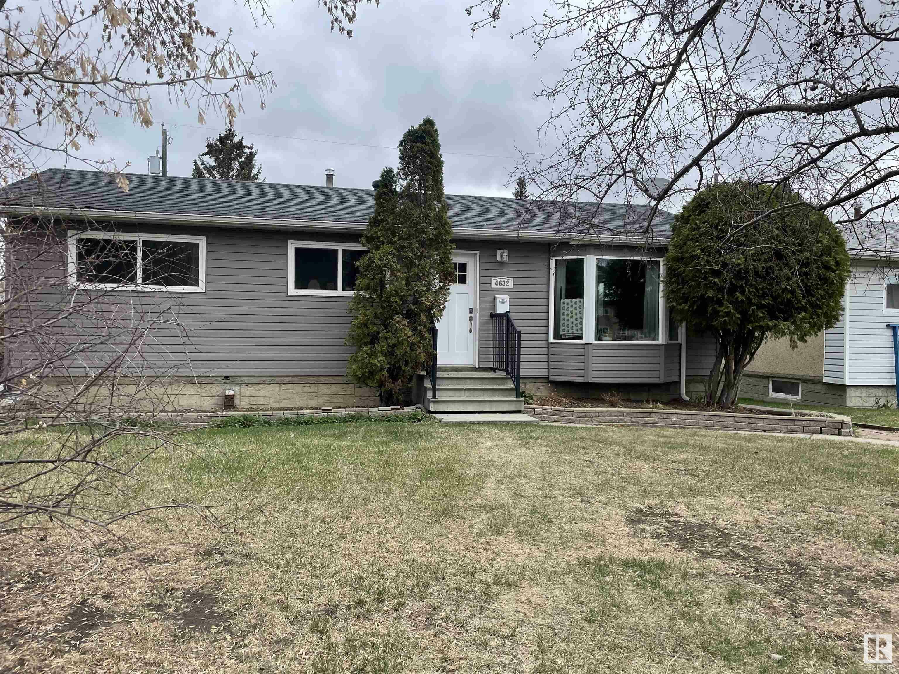 Property Photo:  4632 102 Avenue NW  AB T6A 0M7 