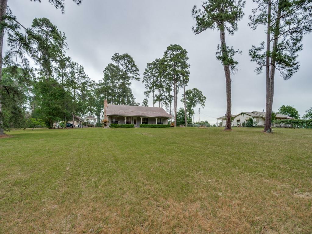 Property Photo:  151 Thompson Road  TX 77331 