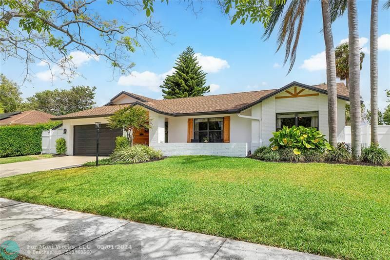 Property Photo: 4225 NW 7th Pl FL 33442