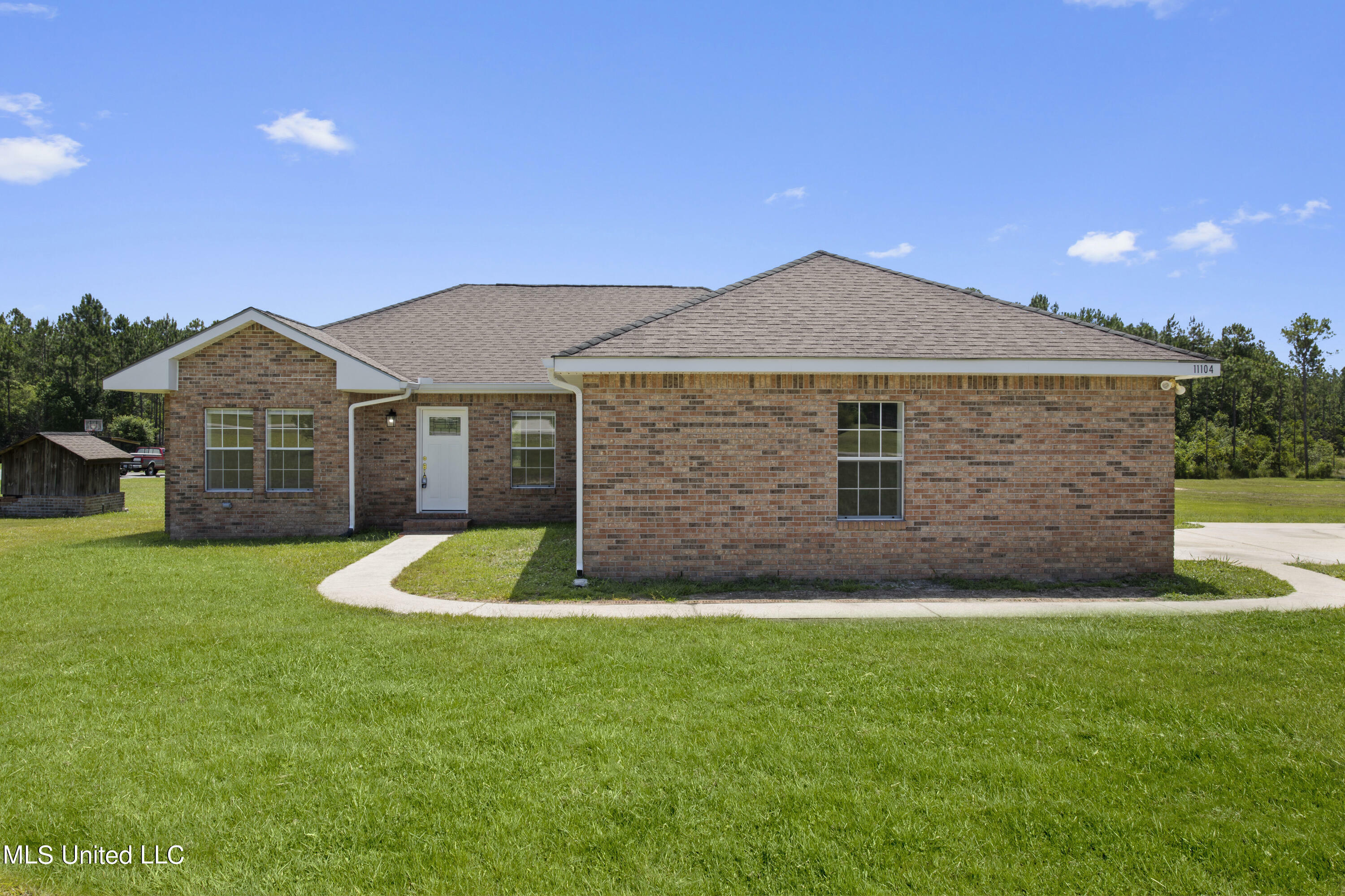 Property Photo:  11104 Pinewood Hills Lane  MS 39565 