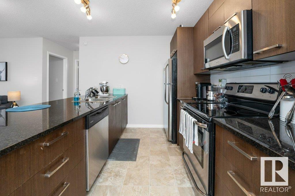 Property Photo:  9351 Simpson Drive NW 3120  AB T6R 0N4 