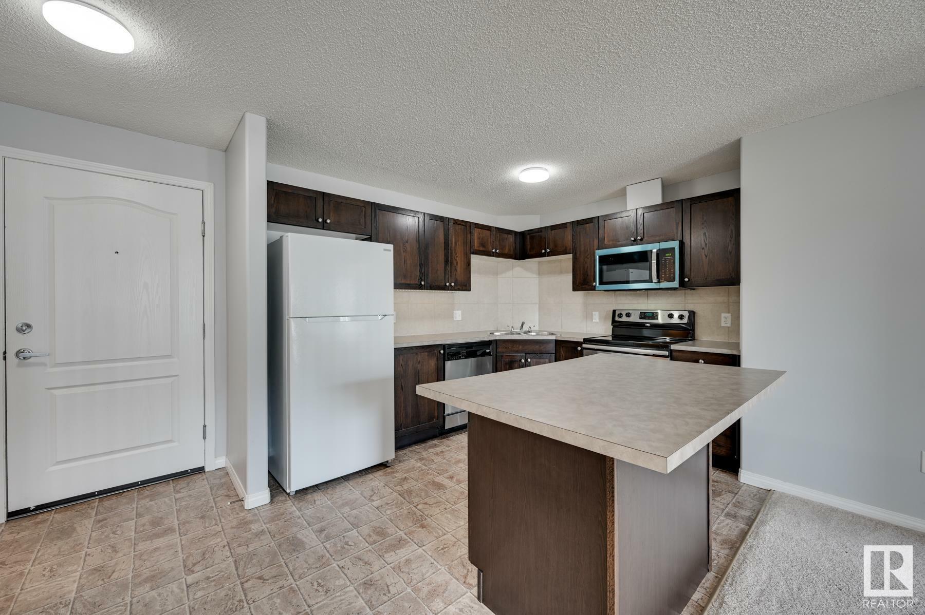 Property Photo:  9363 Simpson Drive NW 1102  AB T6R 0N2 