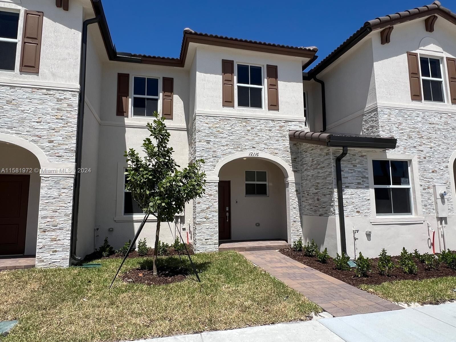 Property Photo:  12116 NW 24th Ct  FL 33167 