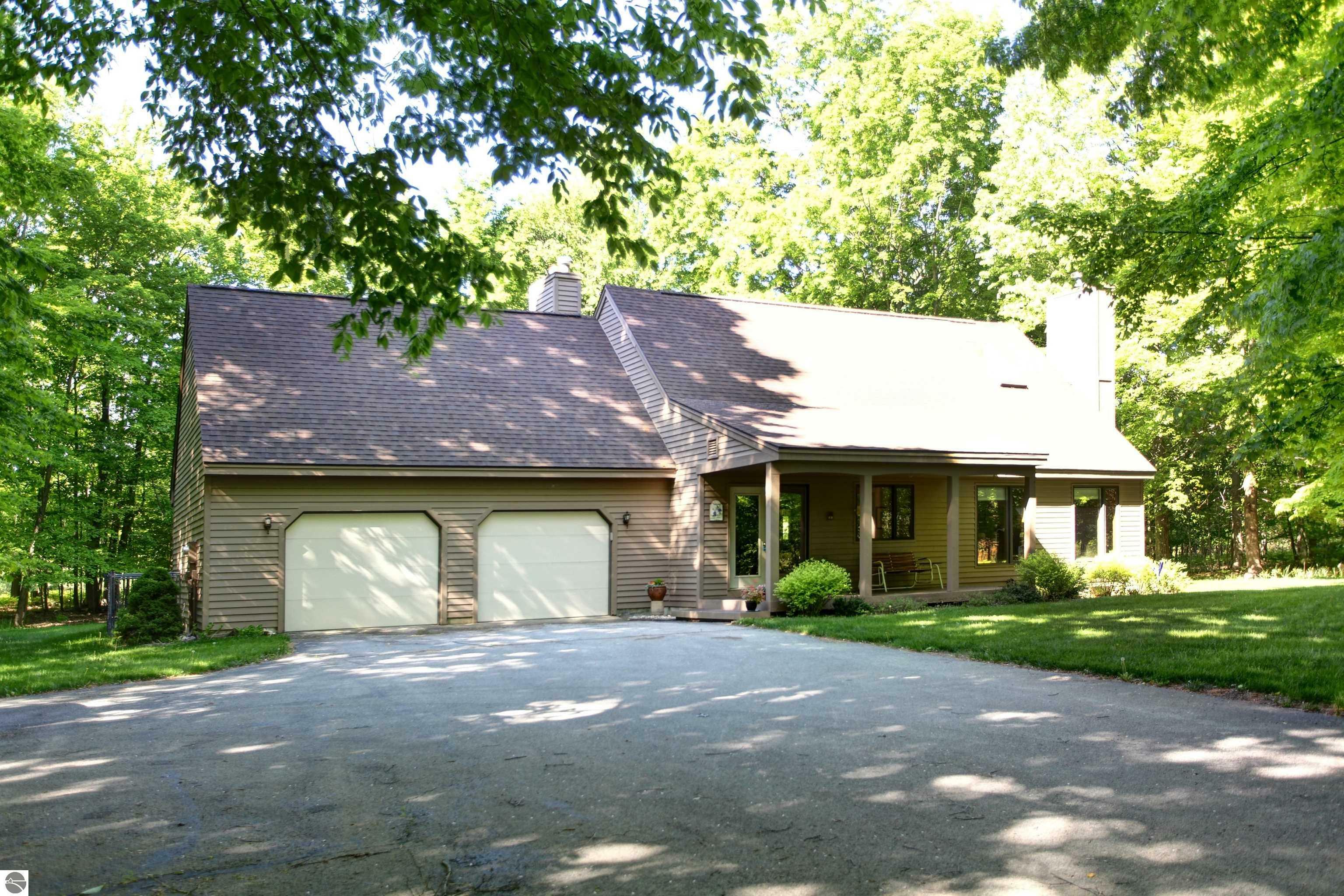 Property Photo:  9750 Amidon Drive  MI 49685 