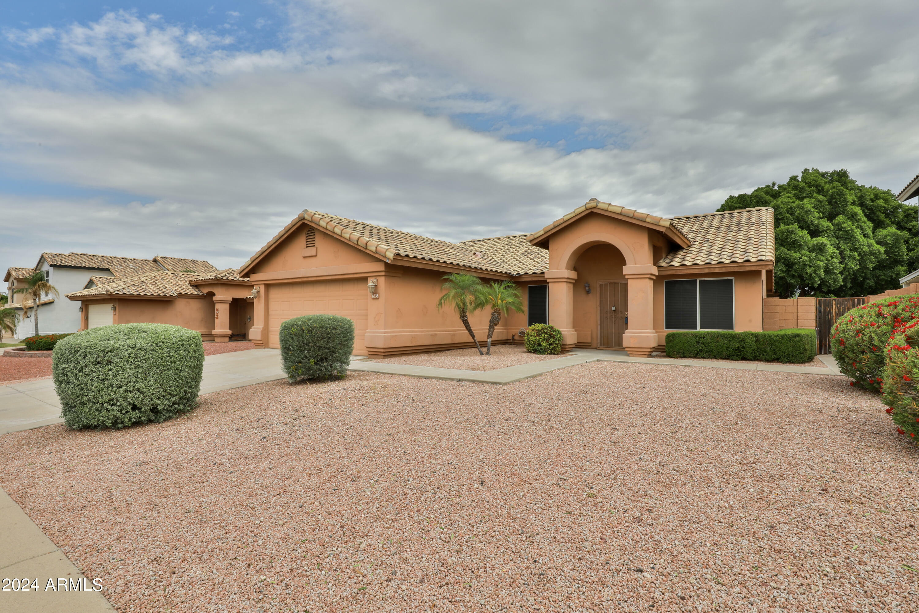 Property Photo:  6338 E Roland Street  AZ 85215 