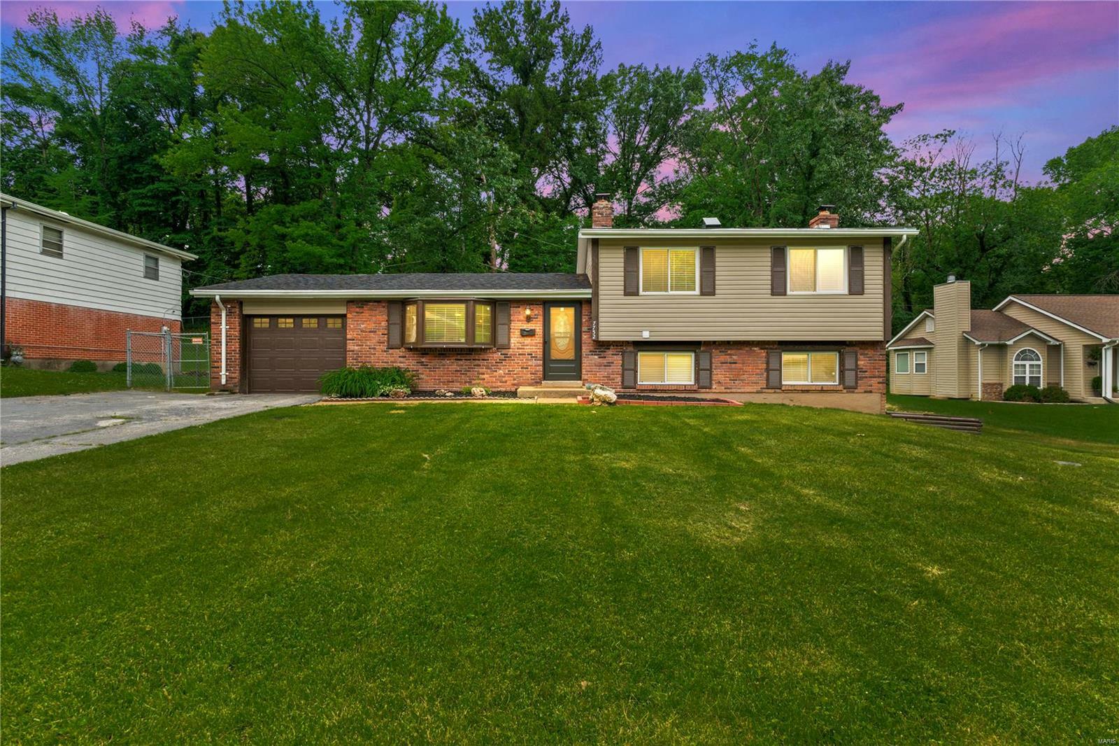 Property Photo:  7752 Wooddale Lane  MO 63121 