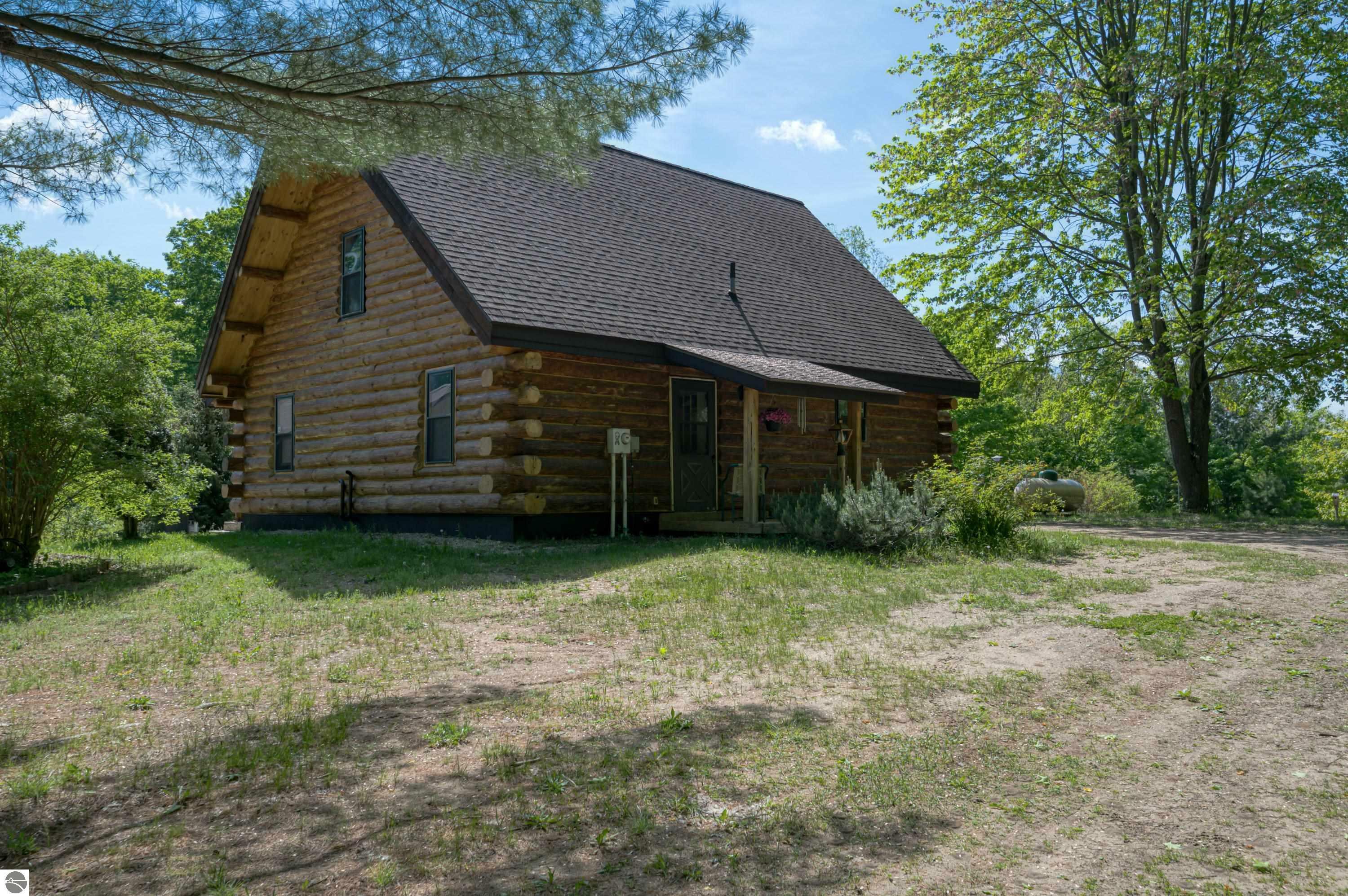 Property Photo:  264 SE W Sharon Road  MI 49633 