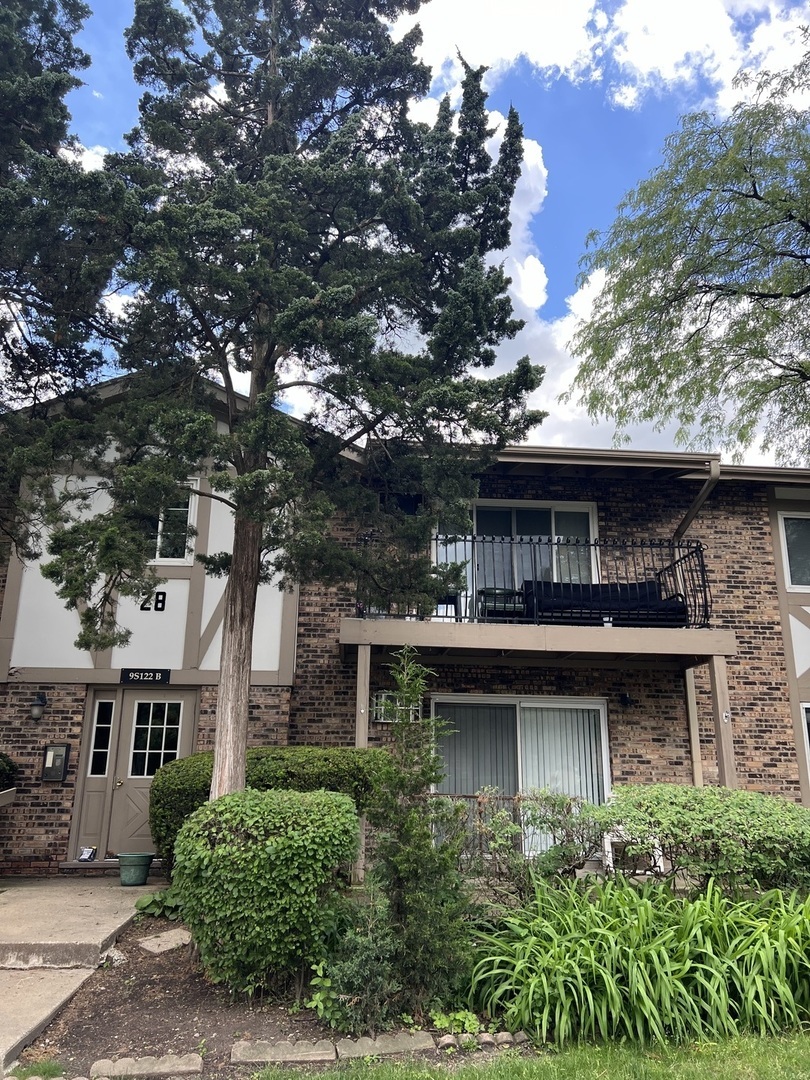 Property Photo:  9S122 Frontage Road 28-107  IL 60527 