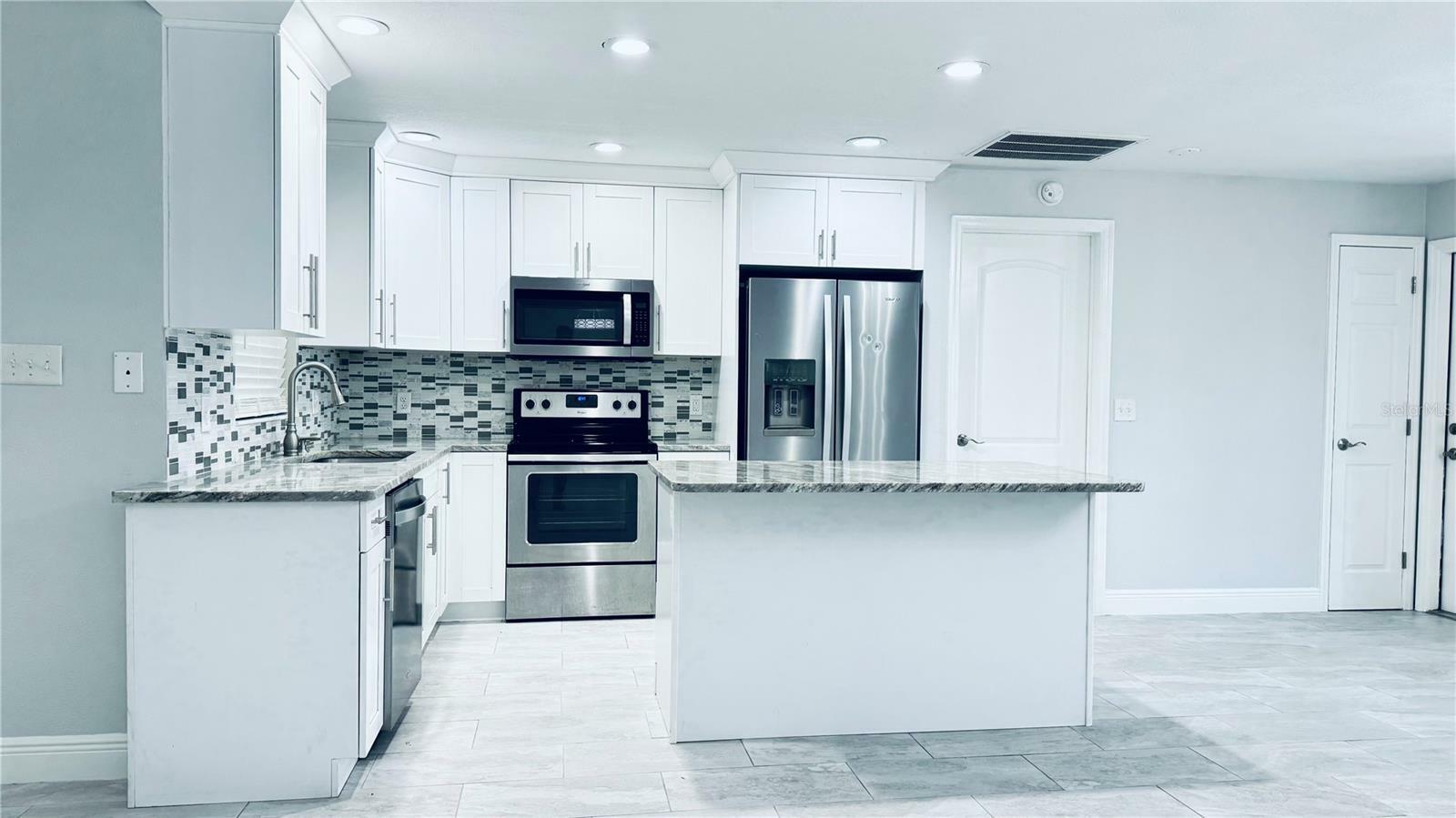 Property Photo: 7424 Isle Drive FL 34668