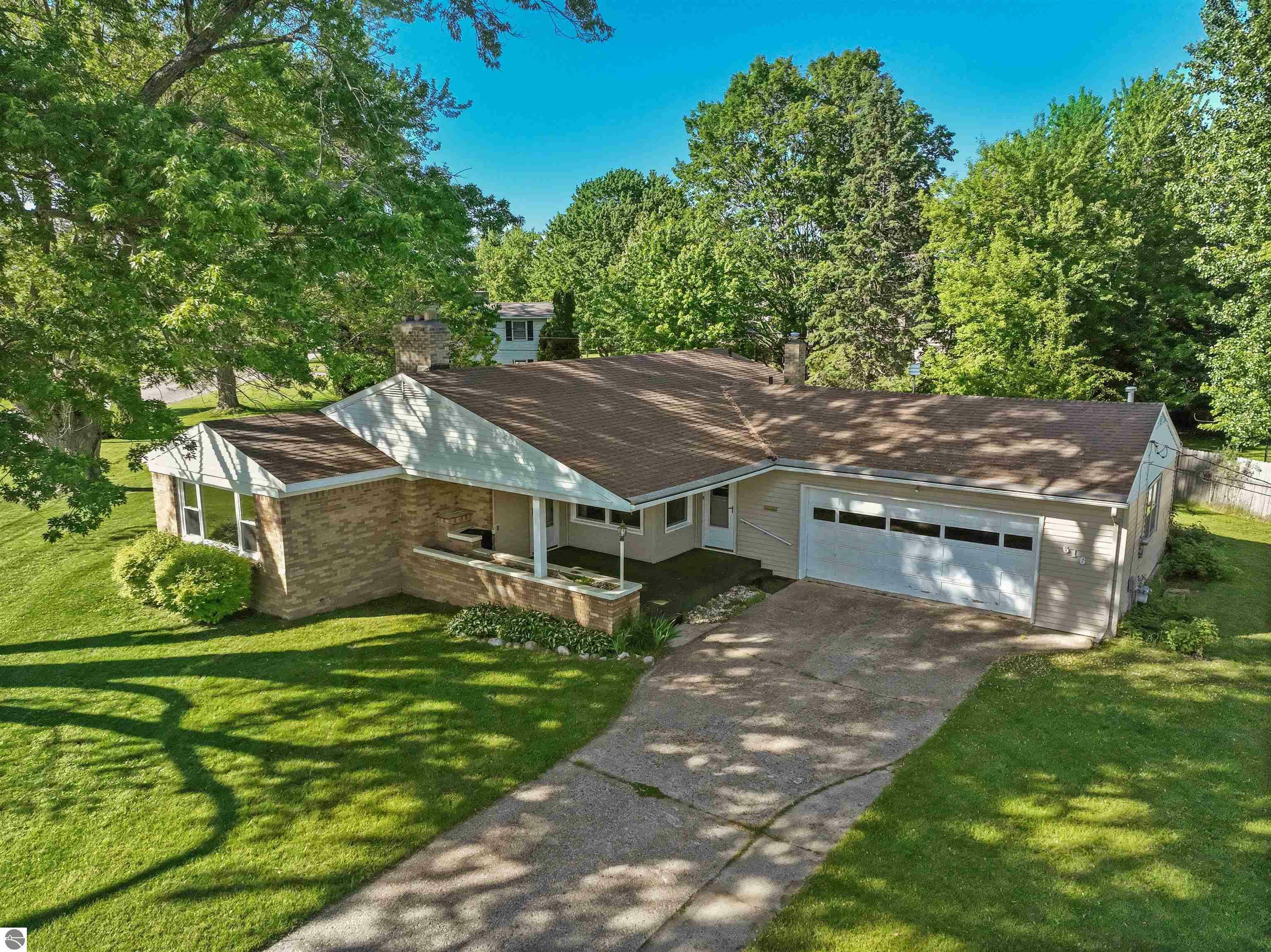 Property Photo:  616 Lakeshore Drive  MI 49601 