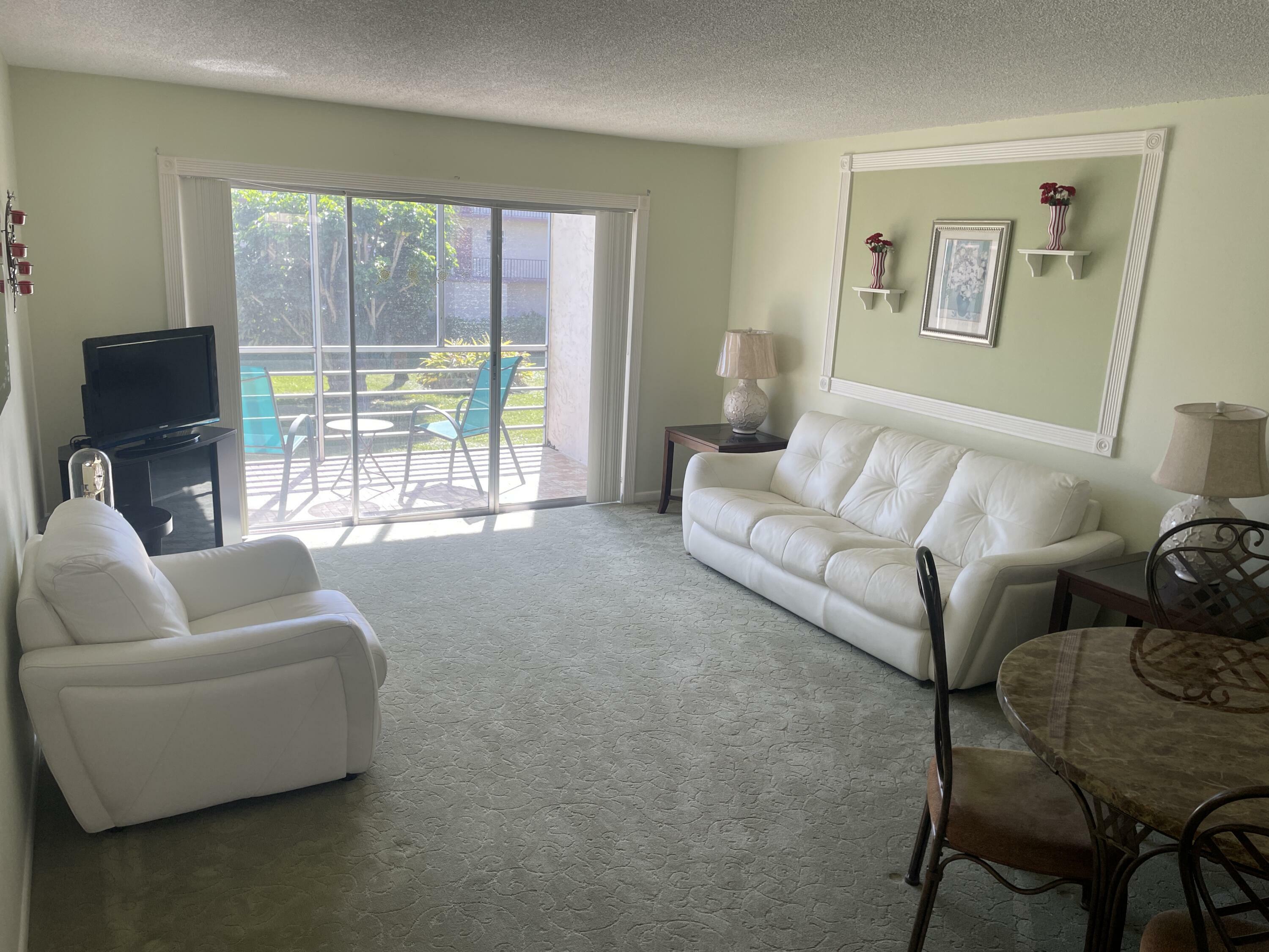 Property Photo:  705 Lori Drive 202  FL 33461 