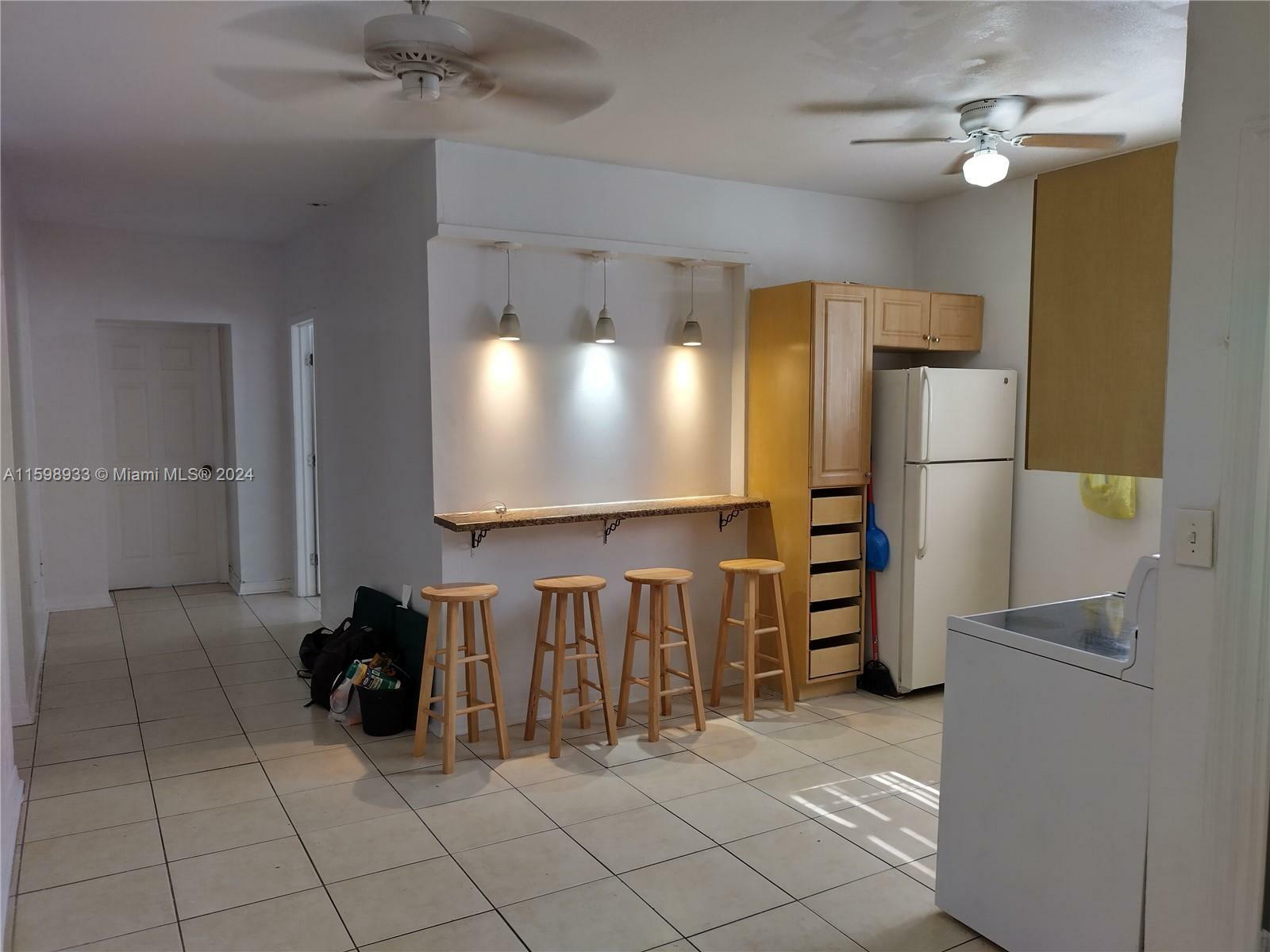 Property Photo:  1021 NW 3rd St 305  FL 33128 