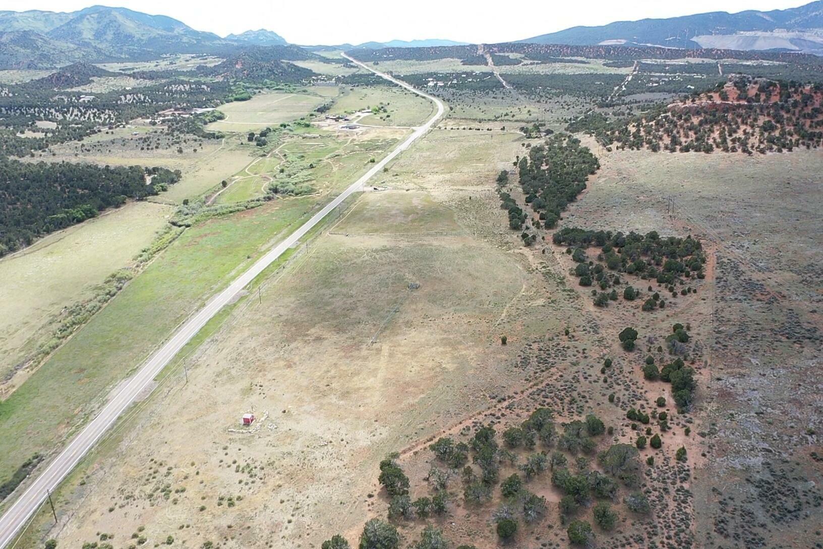 Property Photo:  50.63 Acres Highway 56  UT 84720 