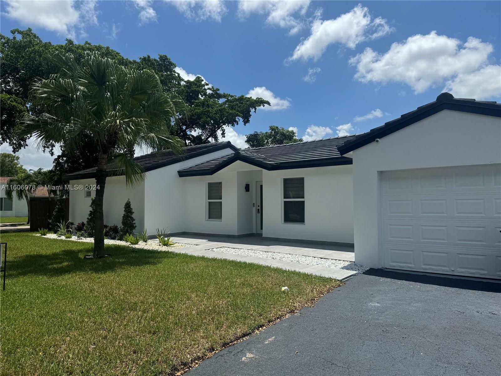 Property Photo:  19120 NW 57th Ct  FL 33015 