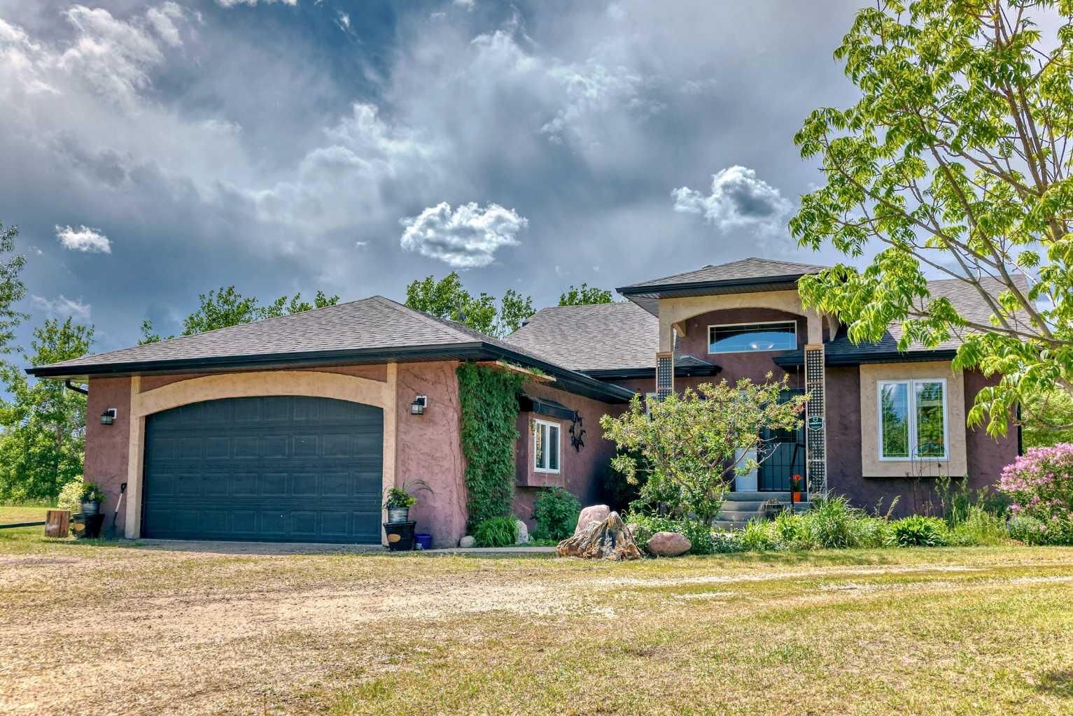Property Photo: 430068 Range Road 252 AB T4J 1R1