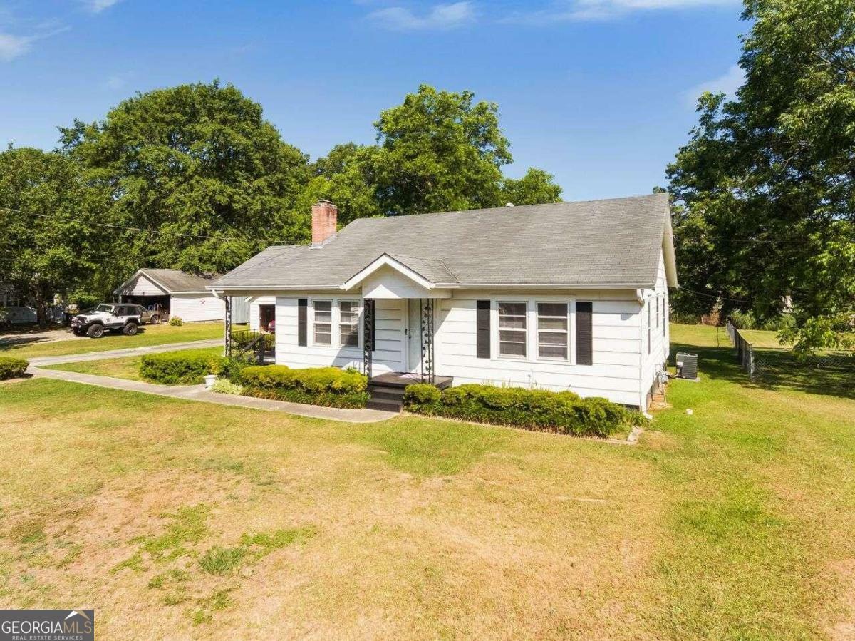 Property Photo:  116 Poplar Street  GA 30213 