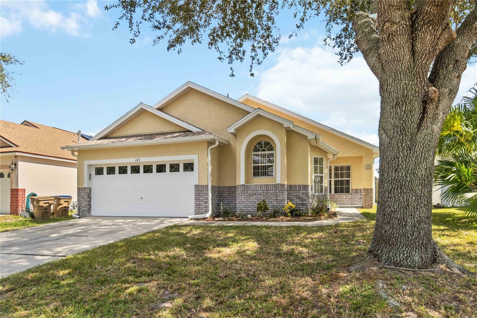 Property Photo:  103 S Roma Way  FL 34746 