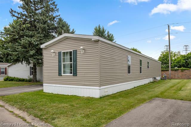 Property Photo:  39585 Neston  Street  MI 48377 