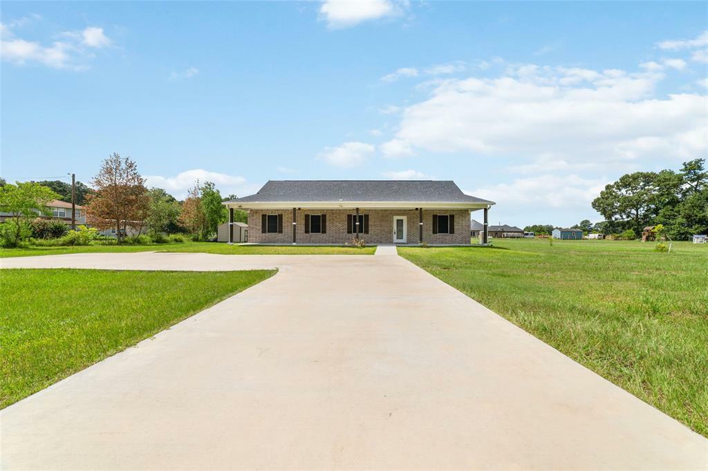 Property Photo:  64 County Road 2293  TX 77327 