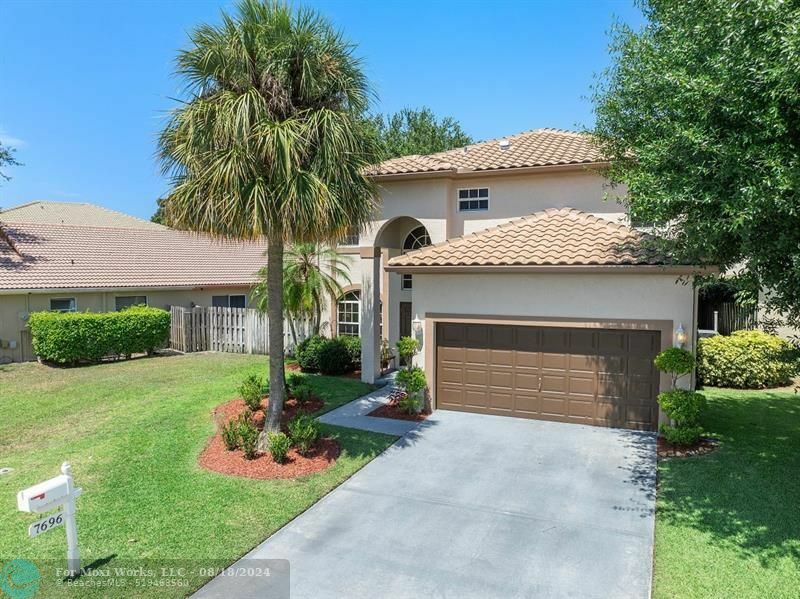 Property Photo:  7696 Northtree Way  FL 33467 