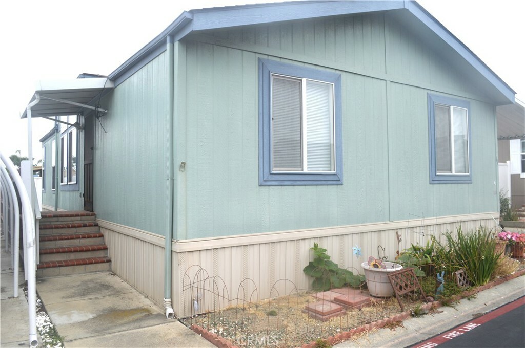 Property Photo:  7850 Slater Avenue Space #66  CA 92647 