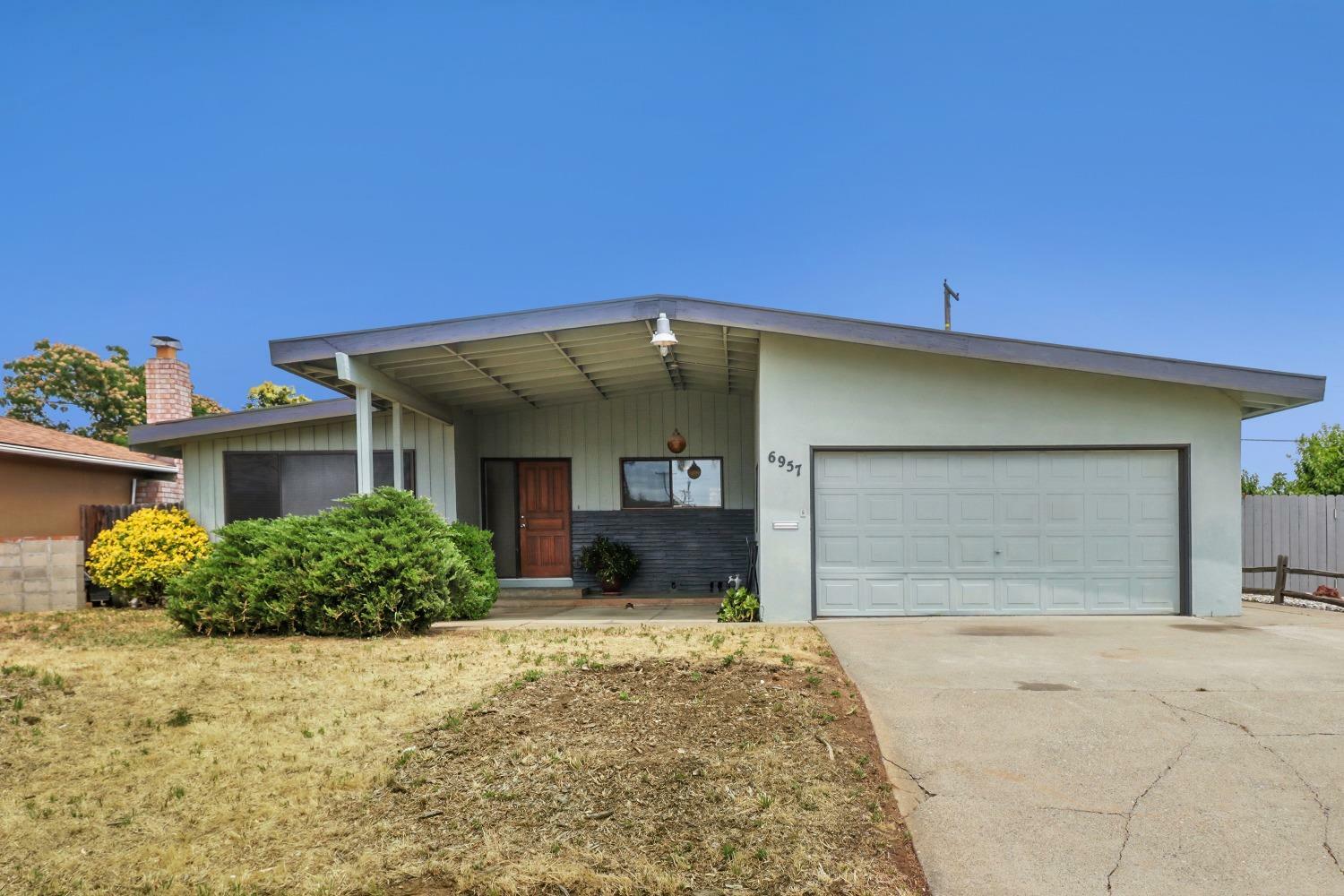 Property Photo:  6957 McQuillan Circle  CA 95820 