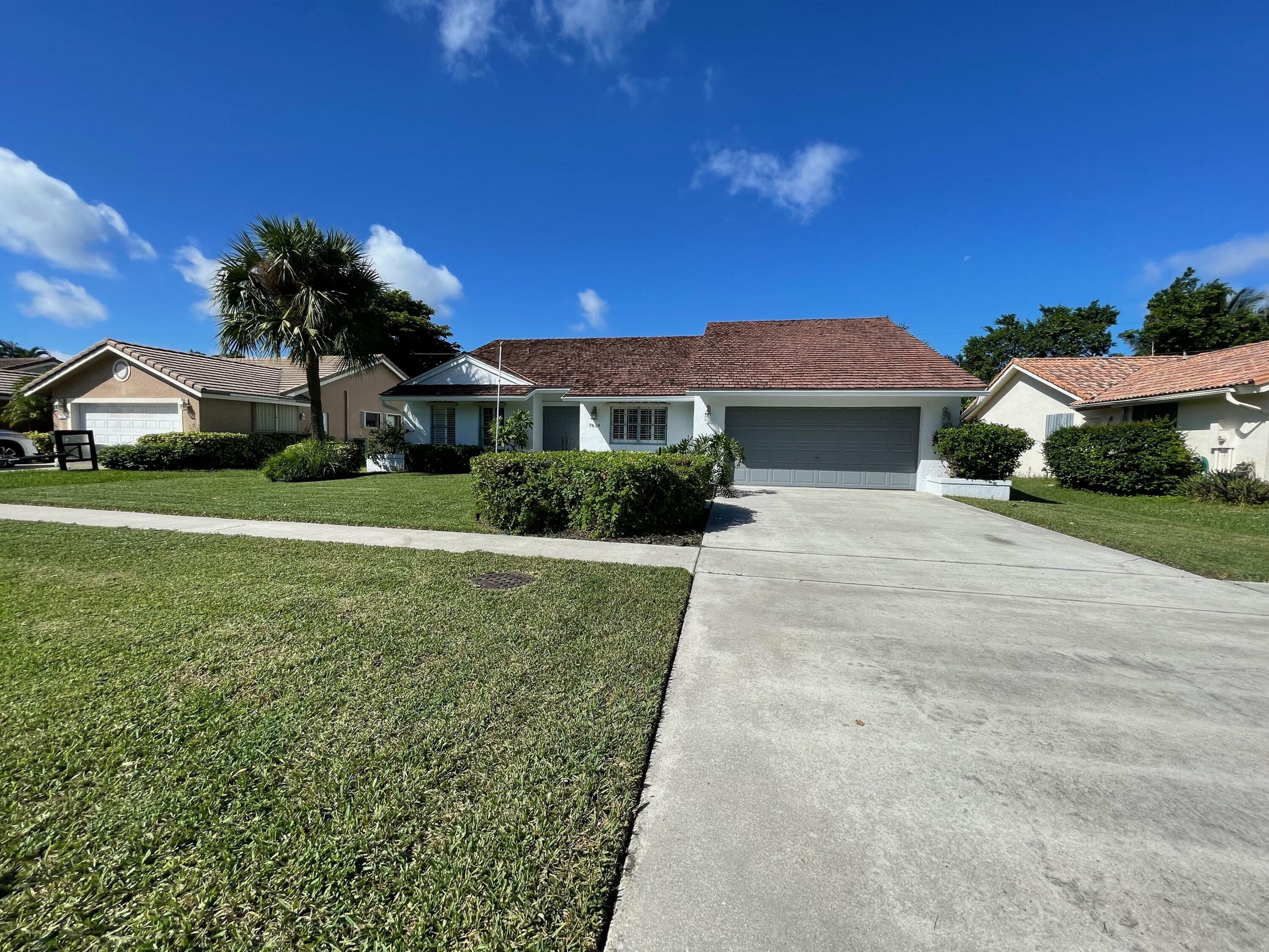 Property Photo:  7619 W Country Club Boulevard  FL 33487 