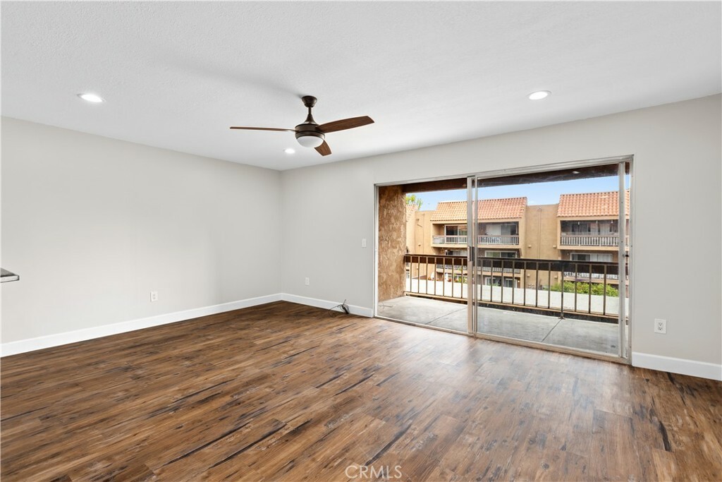 Property Photo:  6600 Warner Avenue 161  CA 92647 