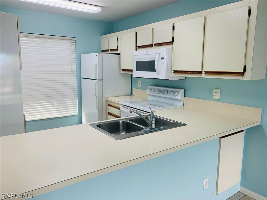 Property Photo:  2225 San Marco Road 5-103  FL 34145 