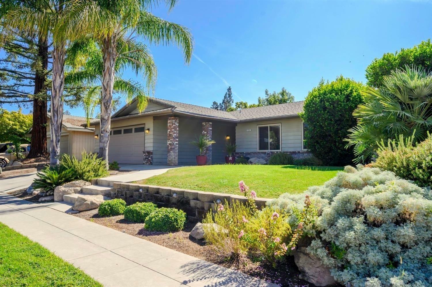 Property Photo:  8292 N Poplar Avenue  CA 93711 