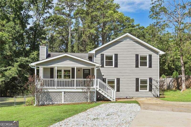 Property Photo:  1845 Lake Lucerne Road SW  GA 30047 