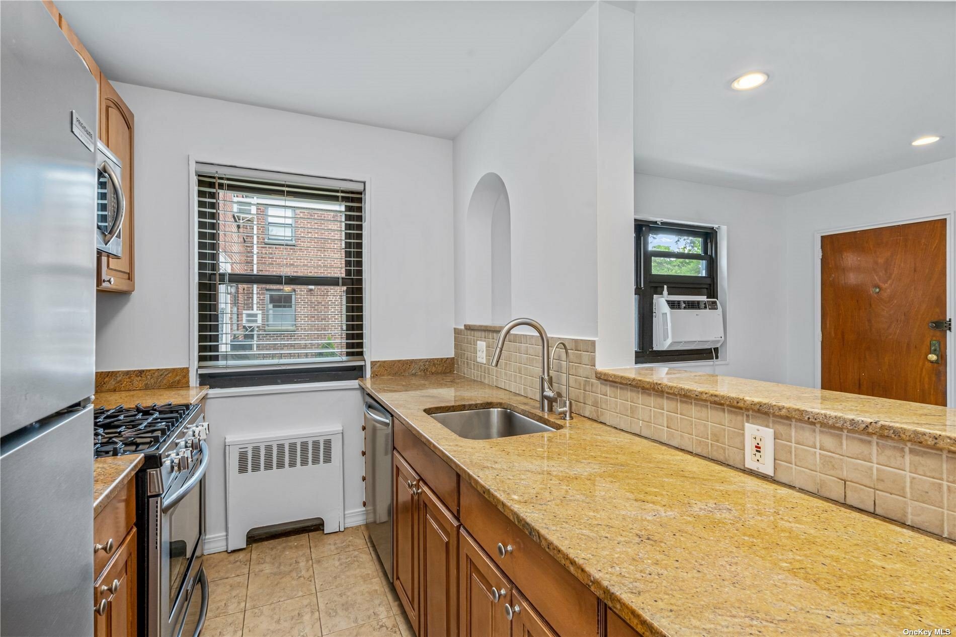 Property Photo:  163-39 Willets Point Boulevard 5-173  NY 11357 