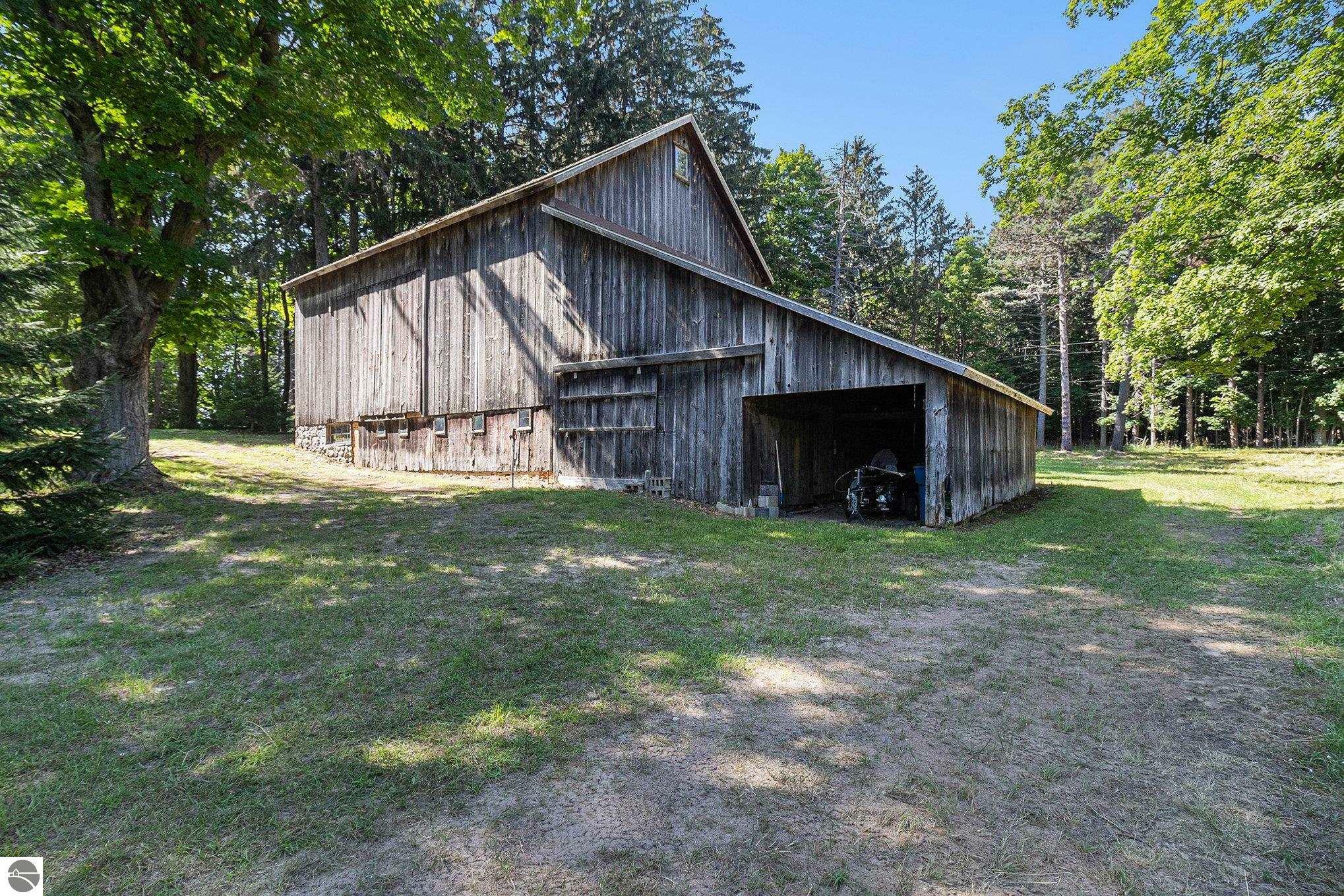 Property Photo:  208 E Cox Road  MI 49635 