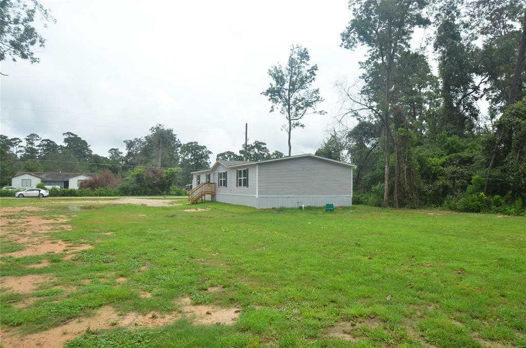 Property Photo:  148 County Road 3704  TX 77372 