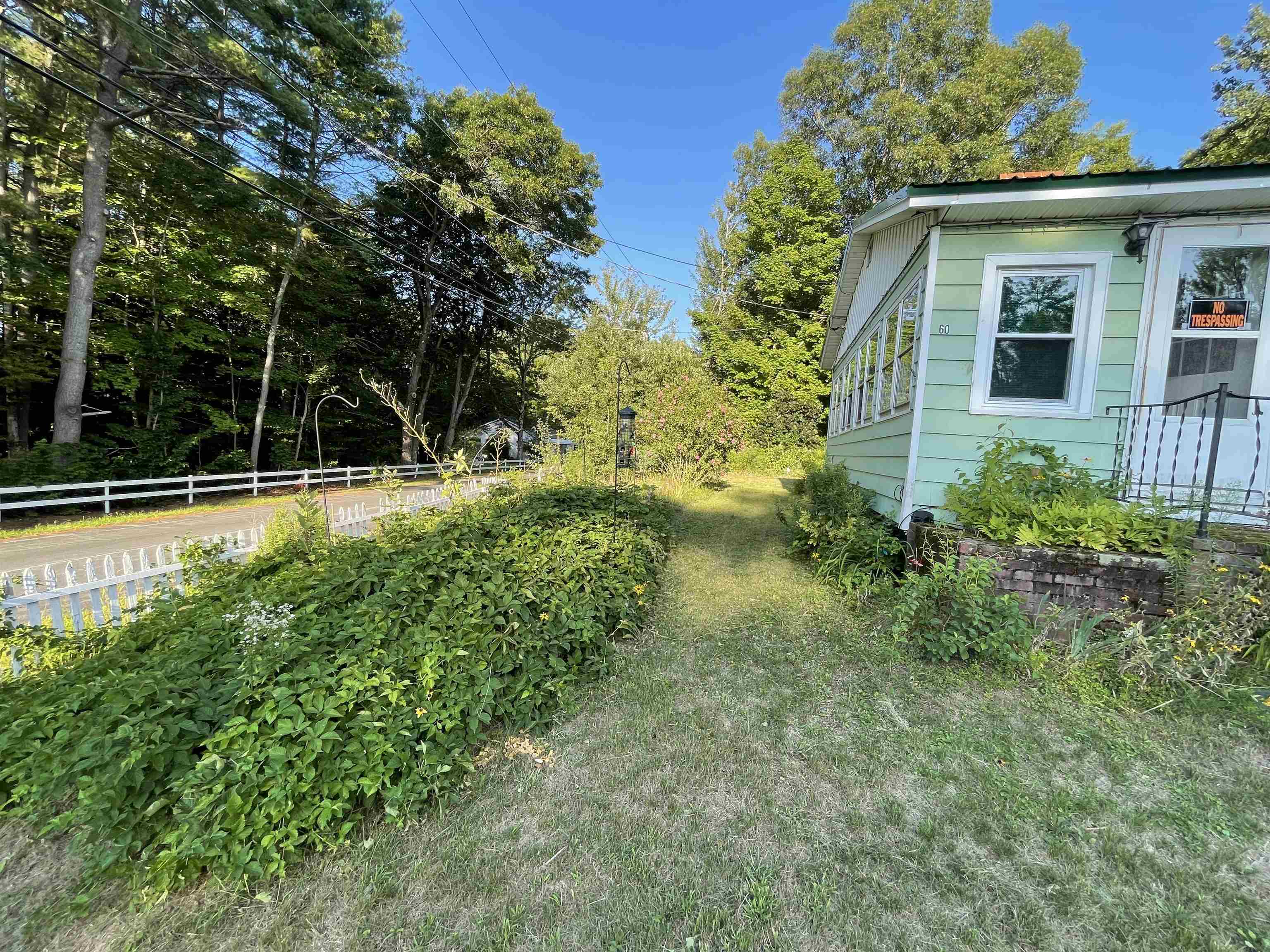 Property Photo:  60 Liscomb Circle  NH 03249 