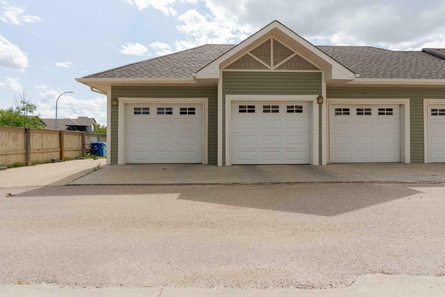 Property Photo:  106 Merganser Crescent  AB T9K 0S4 