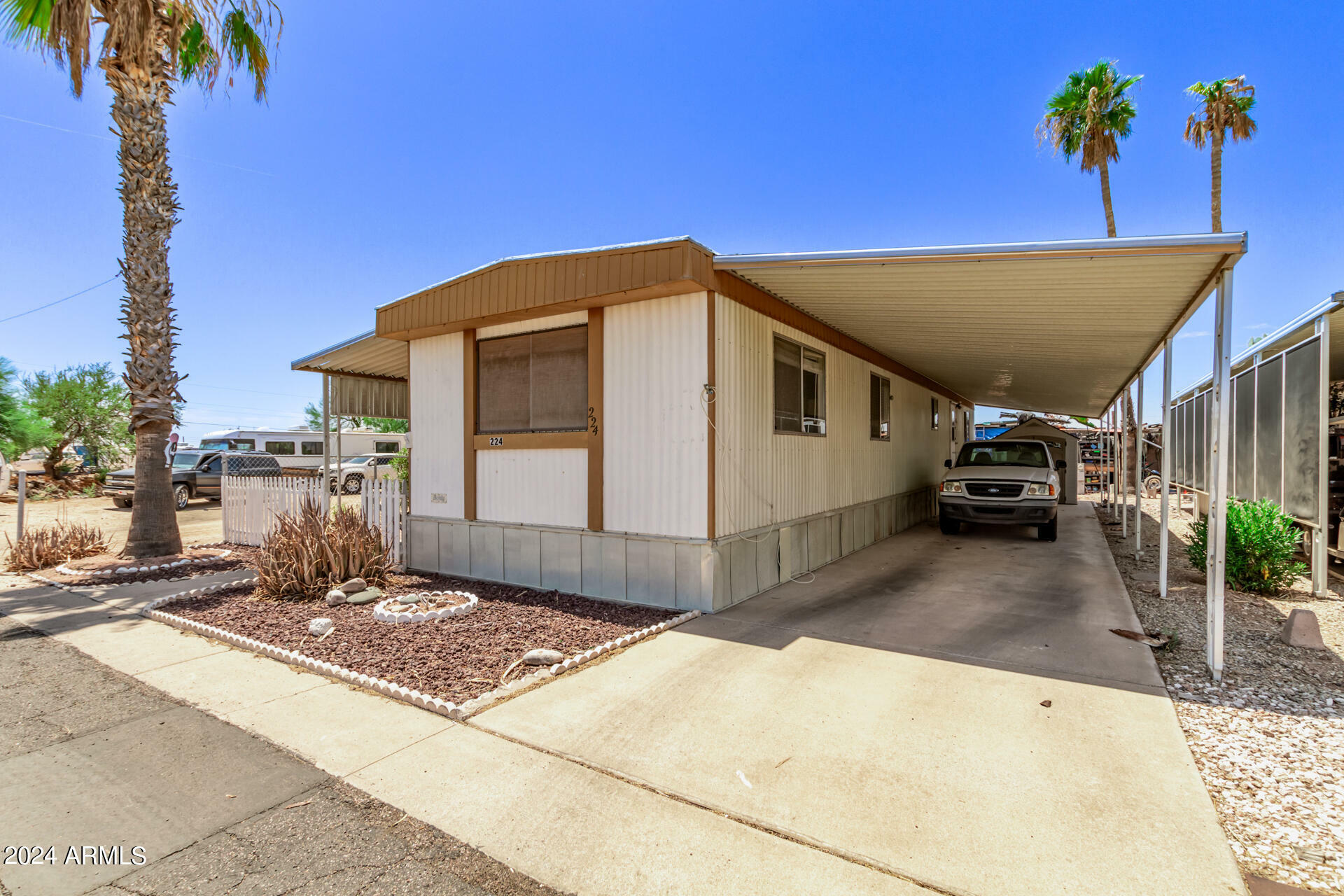 Property Photo:  10220 E Apache Trail -- 224  AZ 85120 